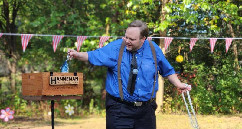 Hanneman the Magician performing with Muffin the Wonder-Fish